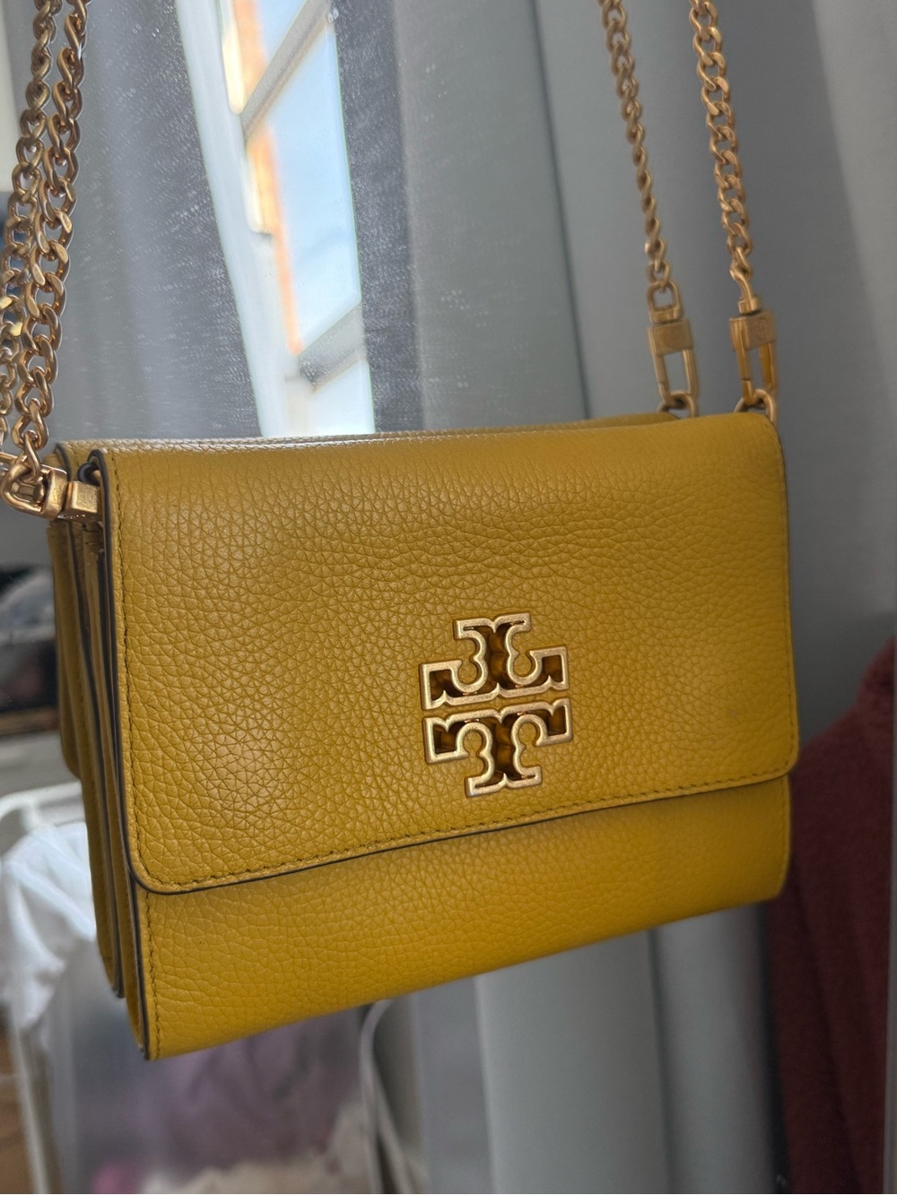 Tory Burch yellow leather crossbody wallet on chain